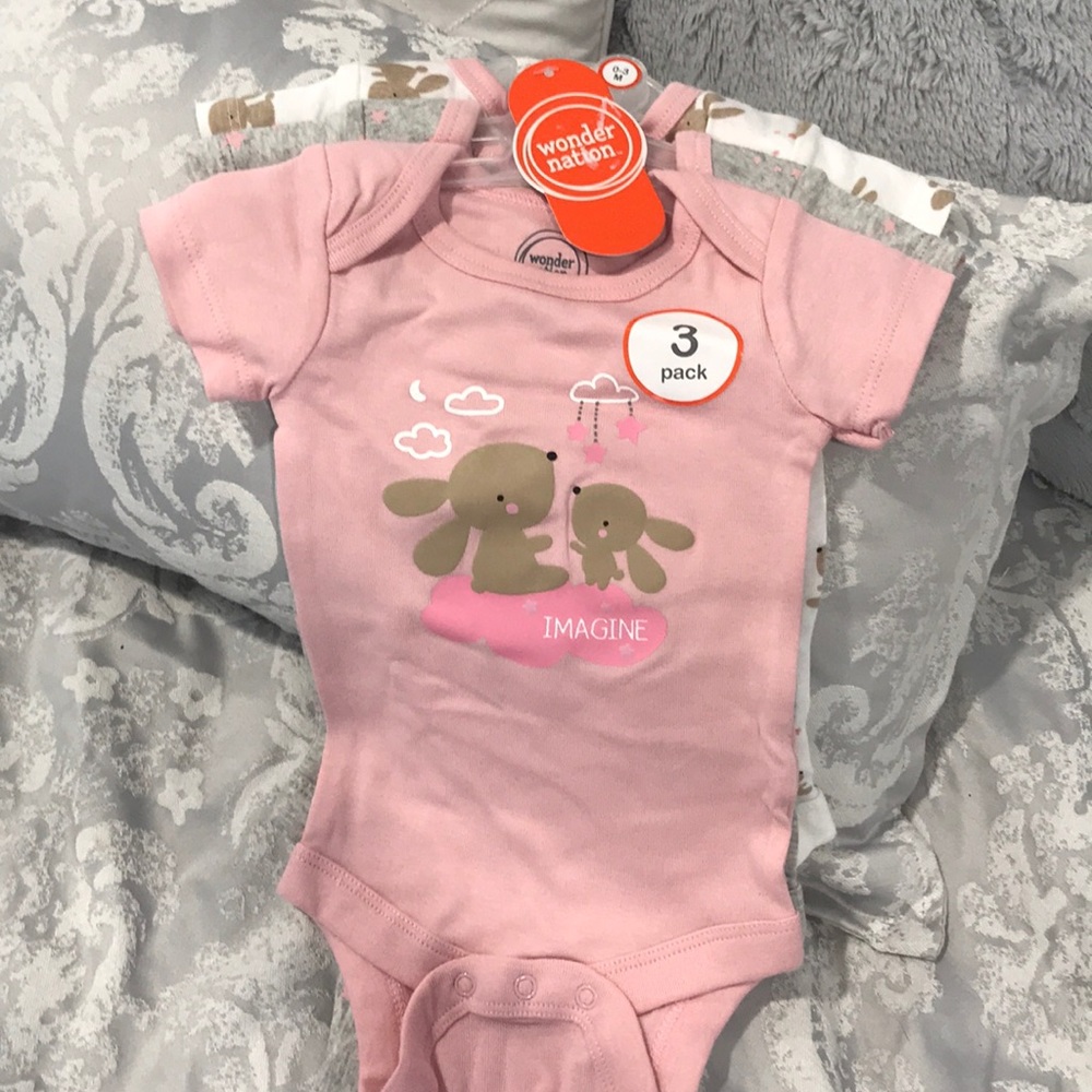 Brand new 3 piece body suit